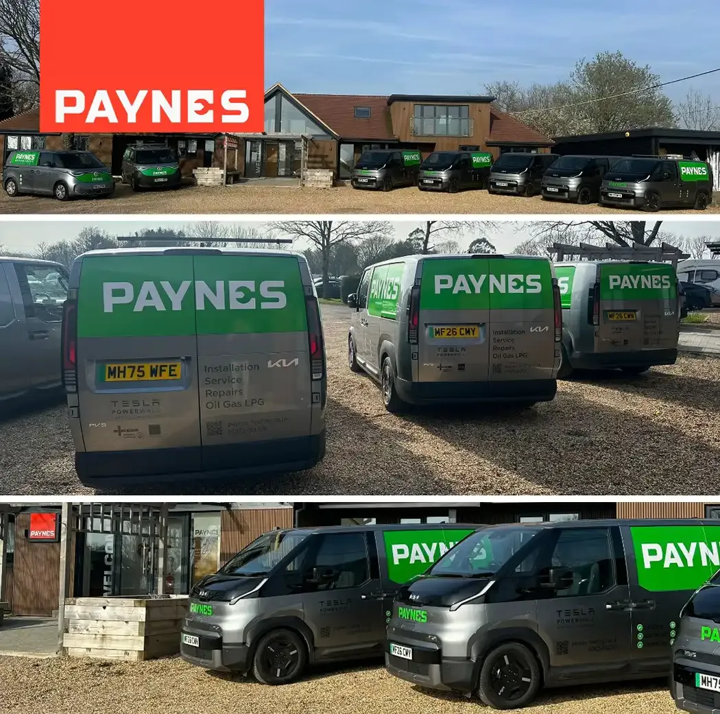 Paynes vans lined up outside a building, seen from above